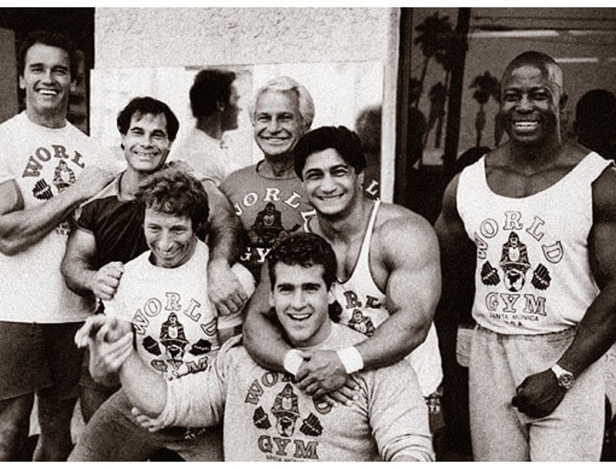 Joe Gold with Arnold schwarzenegger and other bodybuilders